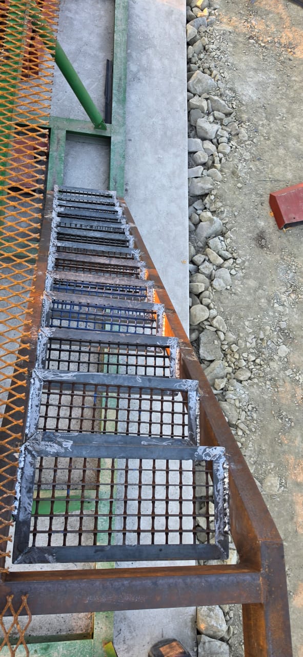 Chrome wash plant — grating stairway close-up